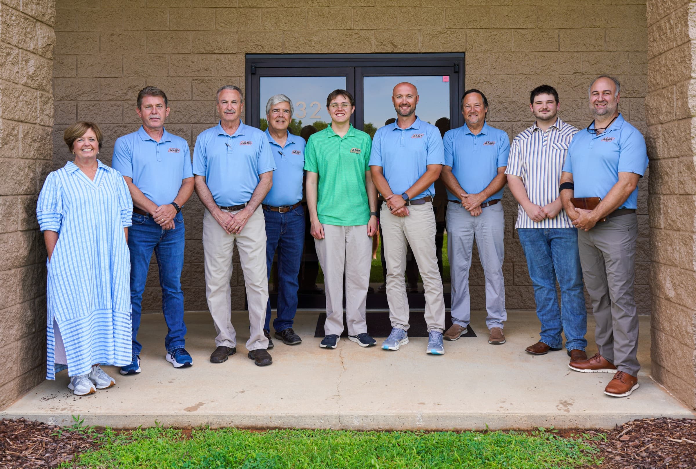 The CEDSI team outside the company's offices